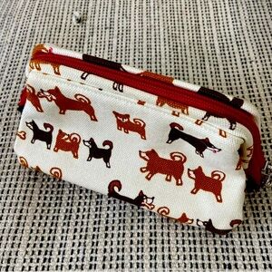 Very cute corgi dog cosmetic bag.  Great condition - from Epcot Japan pavilion.